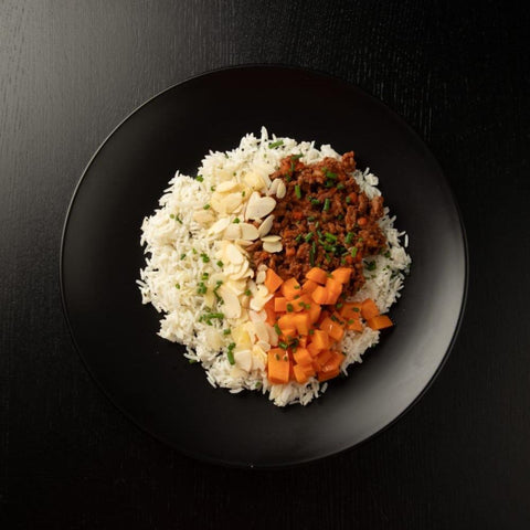 Ragù di magro al timo con riso basmati & mirepoix di patate dolci